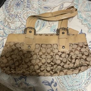 Coach purse and wallet, tan, a little discoloring on wallet as seen in picture